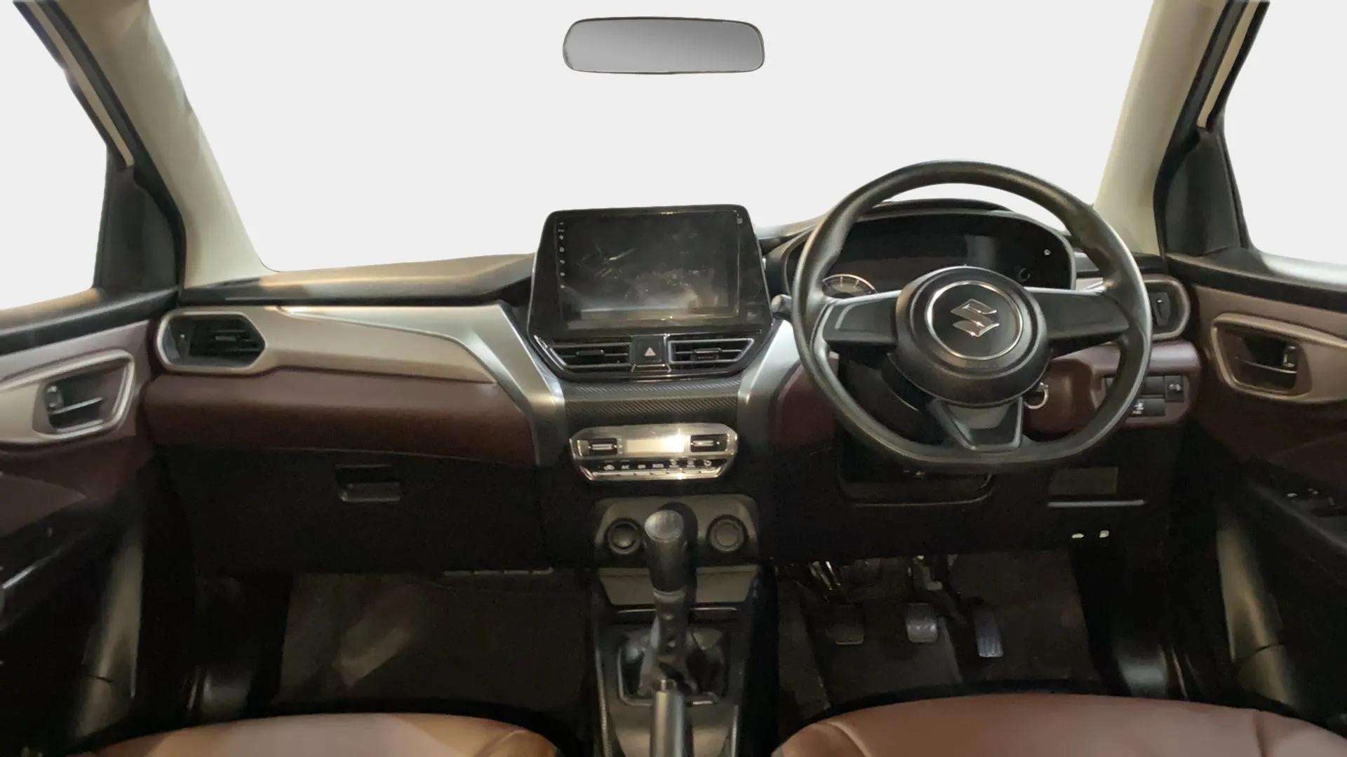 Interior dashboard view of a Maruti Suzuki FRONX