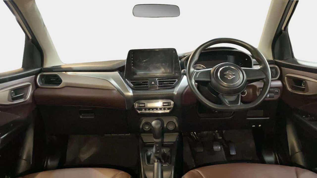 Interior dashboard view of a Maruti Suzuki FRONX