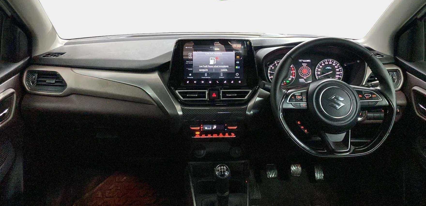 Dashboard and steering view of a Maruti Suzuki FRONX