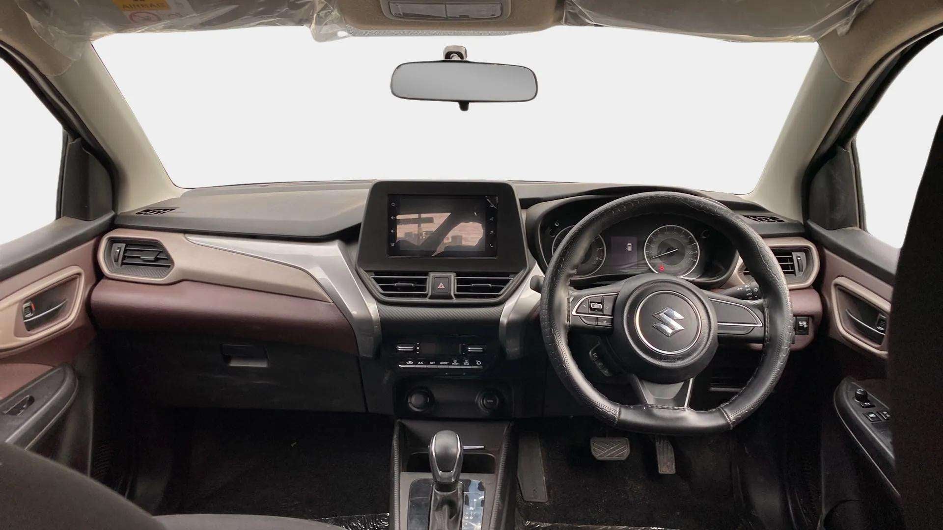 Dashboard and steering wheel view of a Maruti Suzuki FRONX