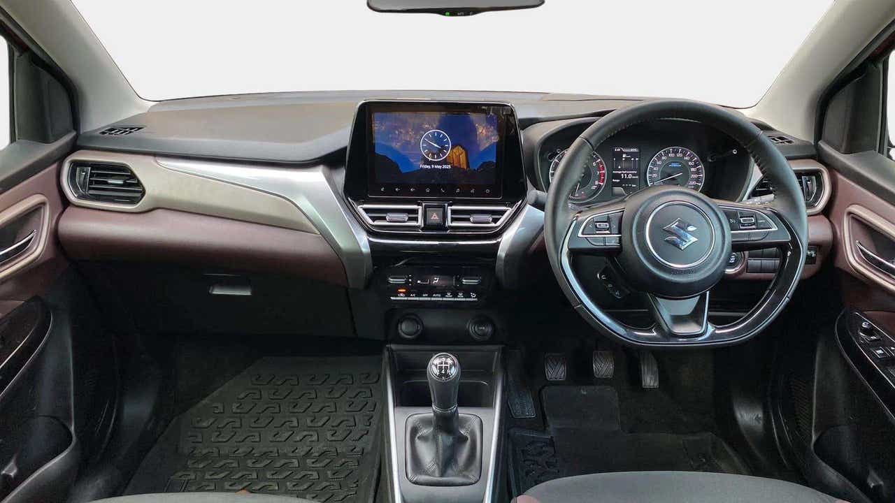 Interior dashboard view of a Maruti Suzuki FRONX