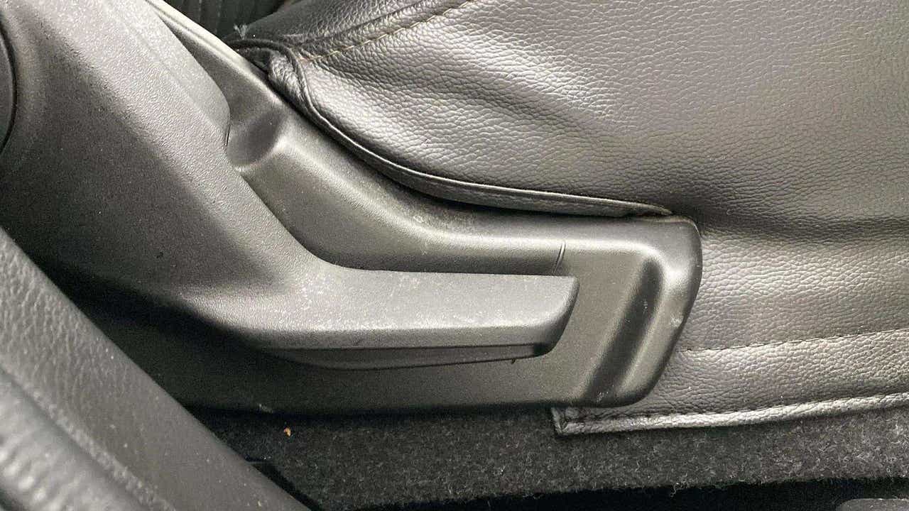 Manual seat adjustment lever of a Maruti Suzuki FRONX