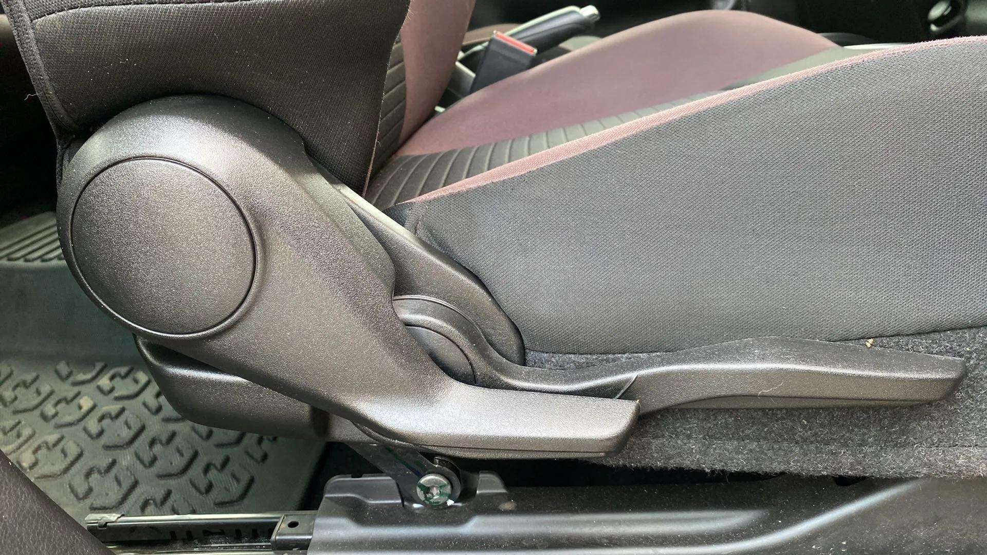 Side view of the front seat adjuster of a Maruti Suzuki FRONX