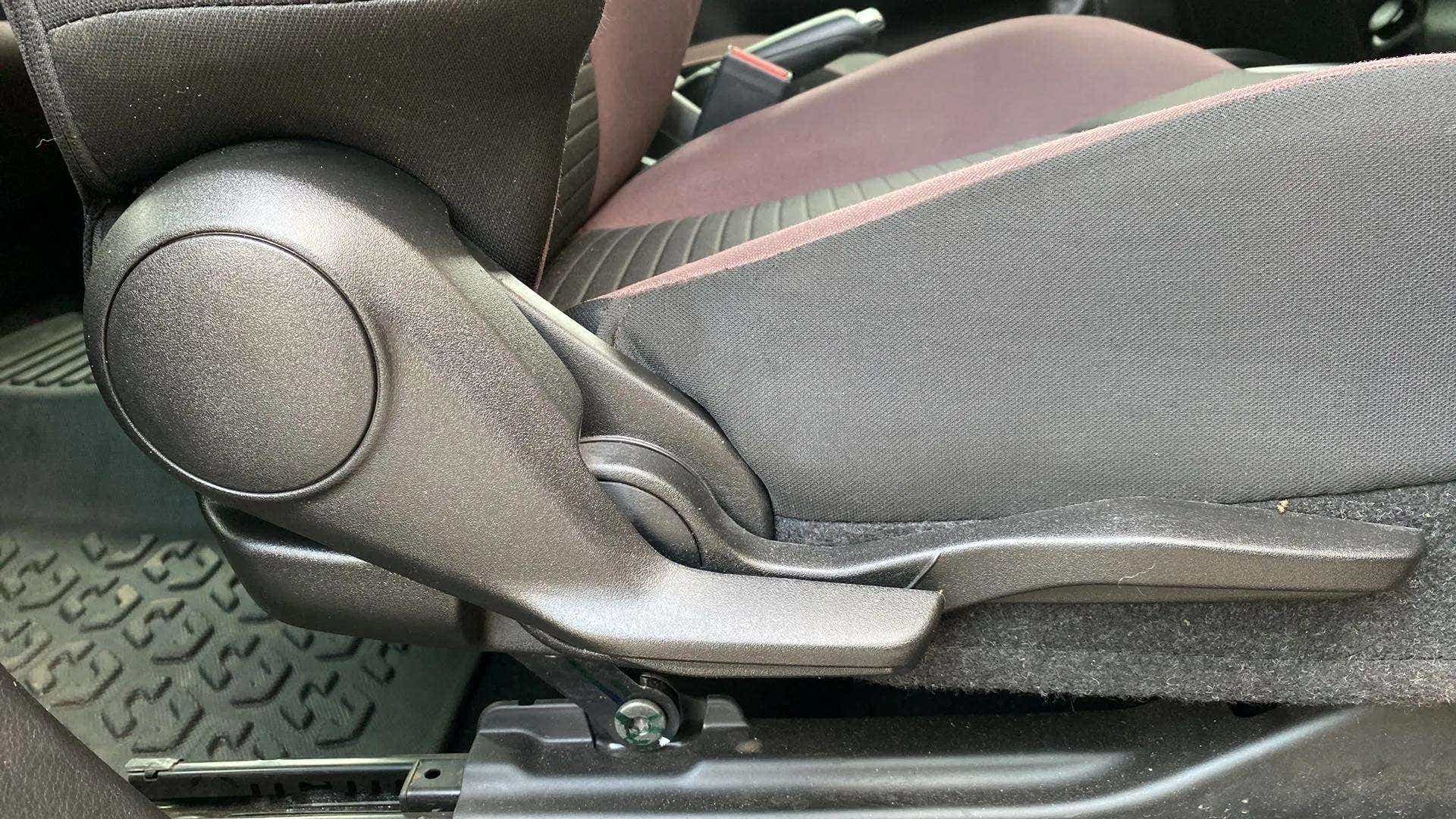 Side view of the front seat adjuster of a Maruti Suzuki FRONX