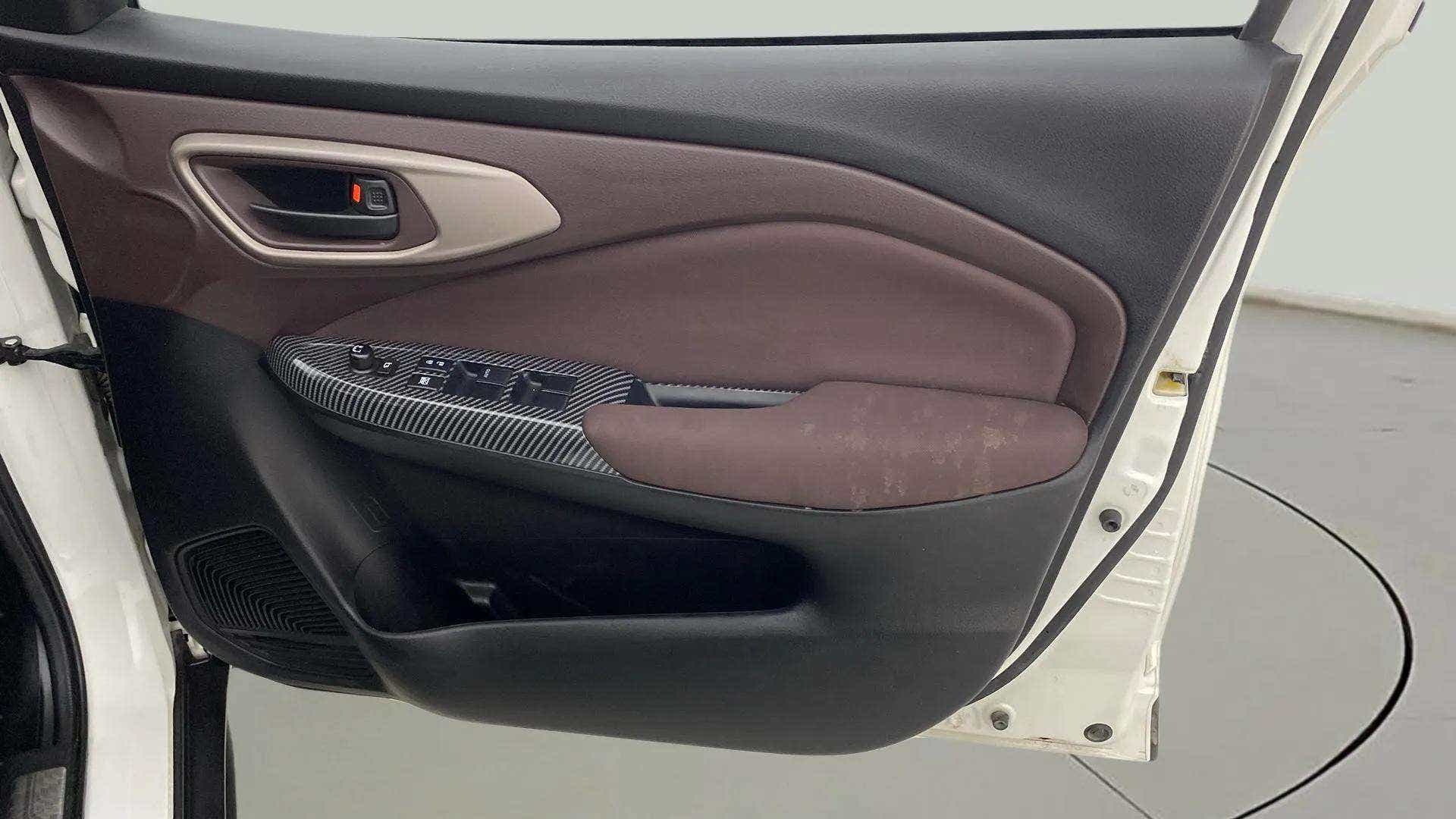Interior door panel of a Maruti Suzuki FRONX