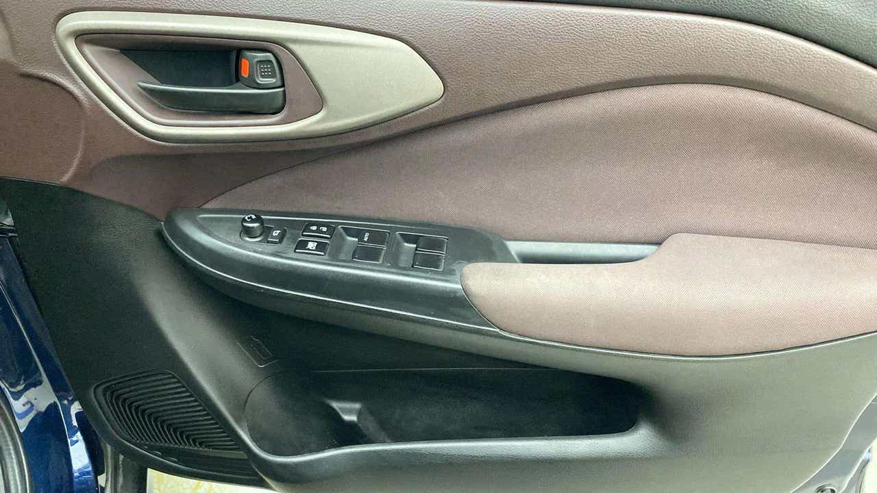 Front driver side door panel of a Maruti Suzuki FRONX