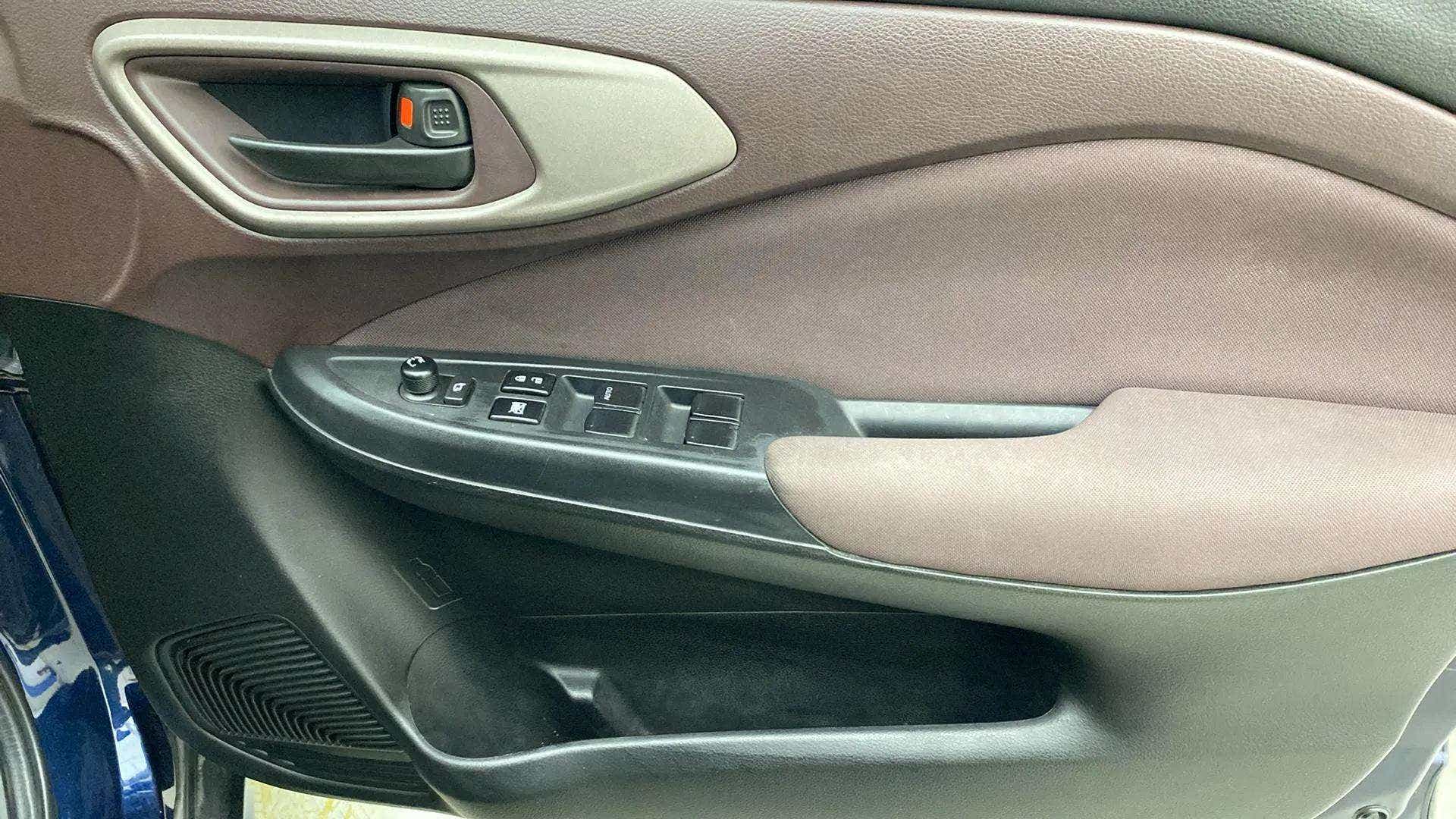 Front driver side door panel of a Maruti Suzuki FRONX