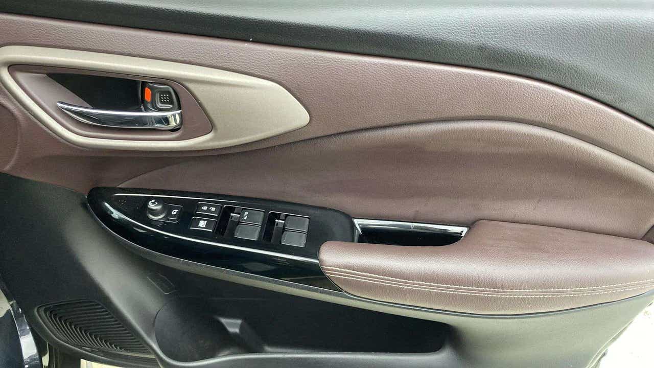 Interior front door panel of a Maruti Suzuki FRONX