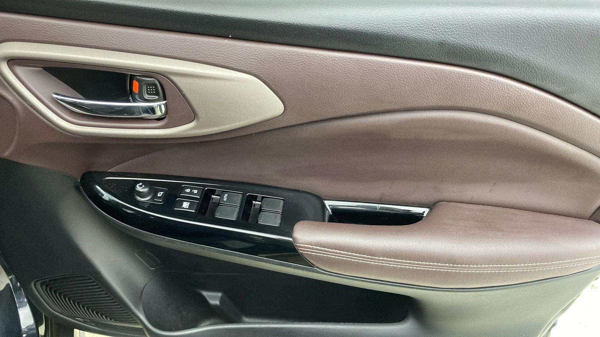Interior front door panel of a Maruti Suzuki FRONX
