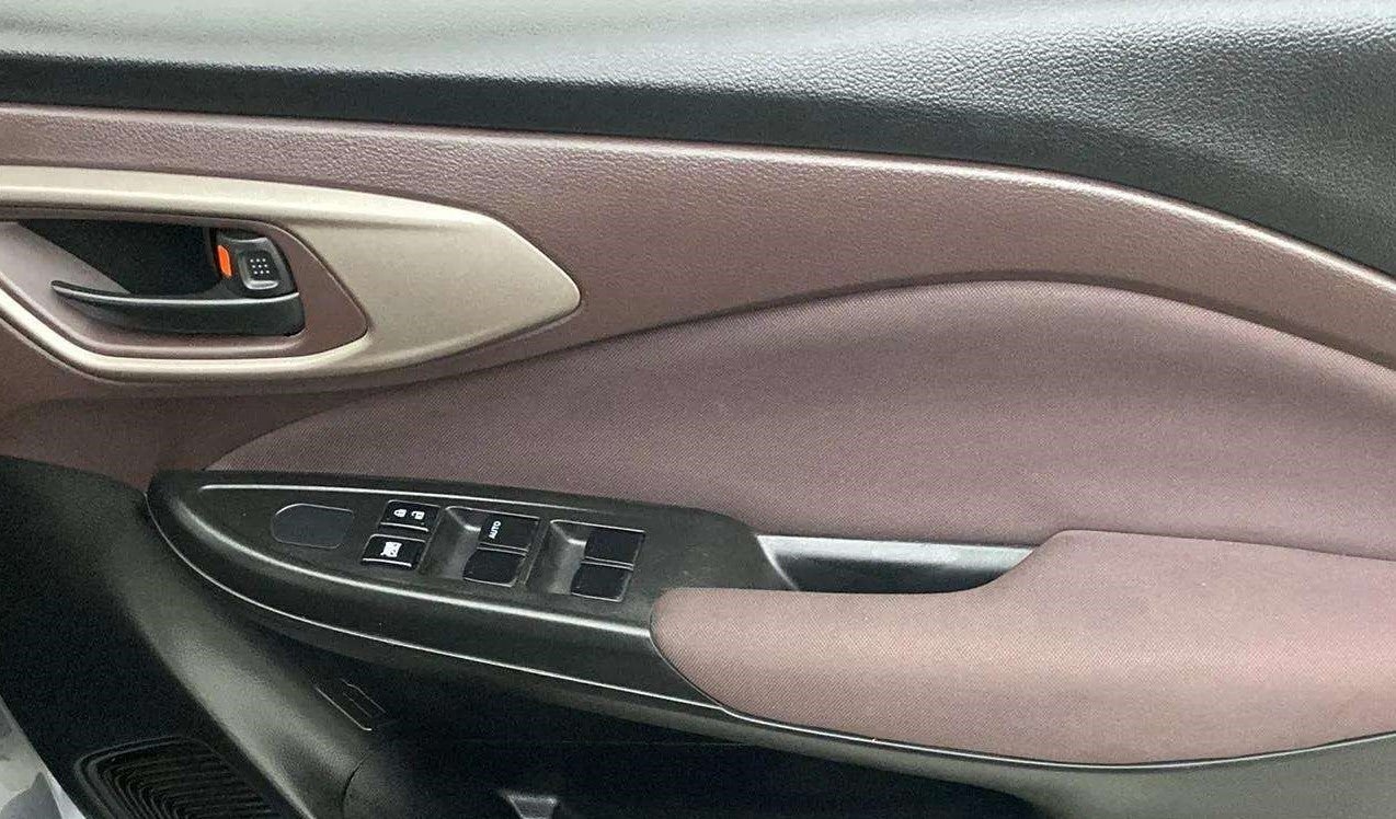 Interior door panel of a Maruti Suzuki FRONX