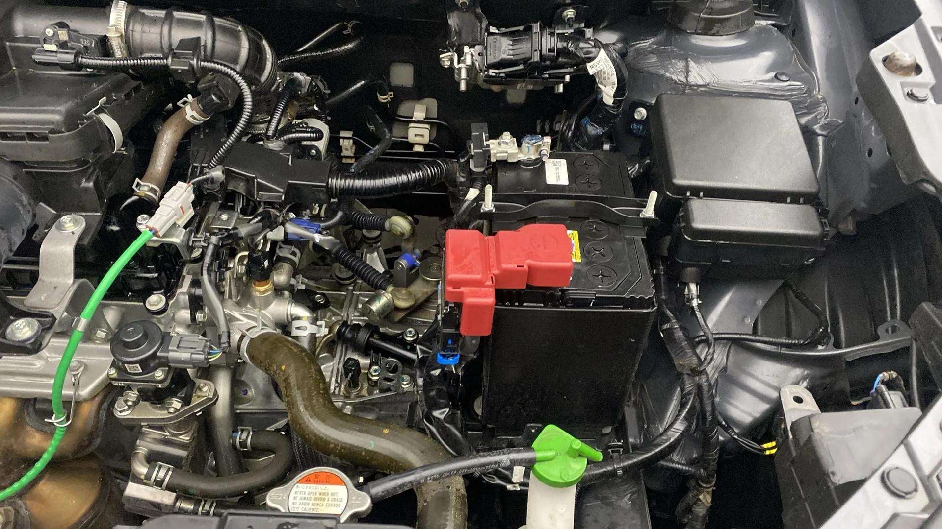 Engine bay of a Maruti Suzuki FRONX