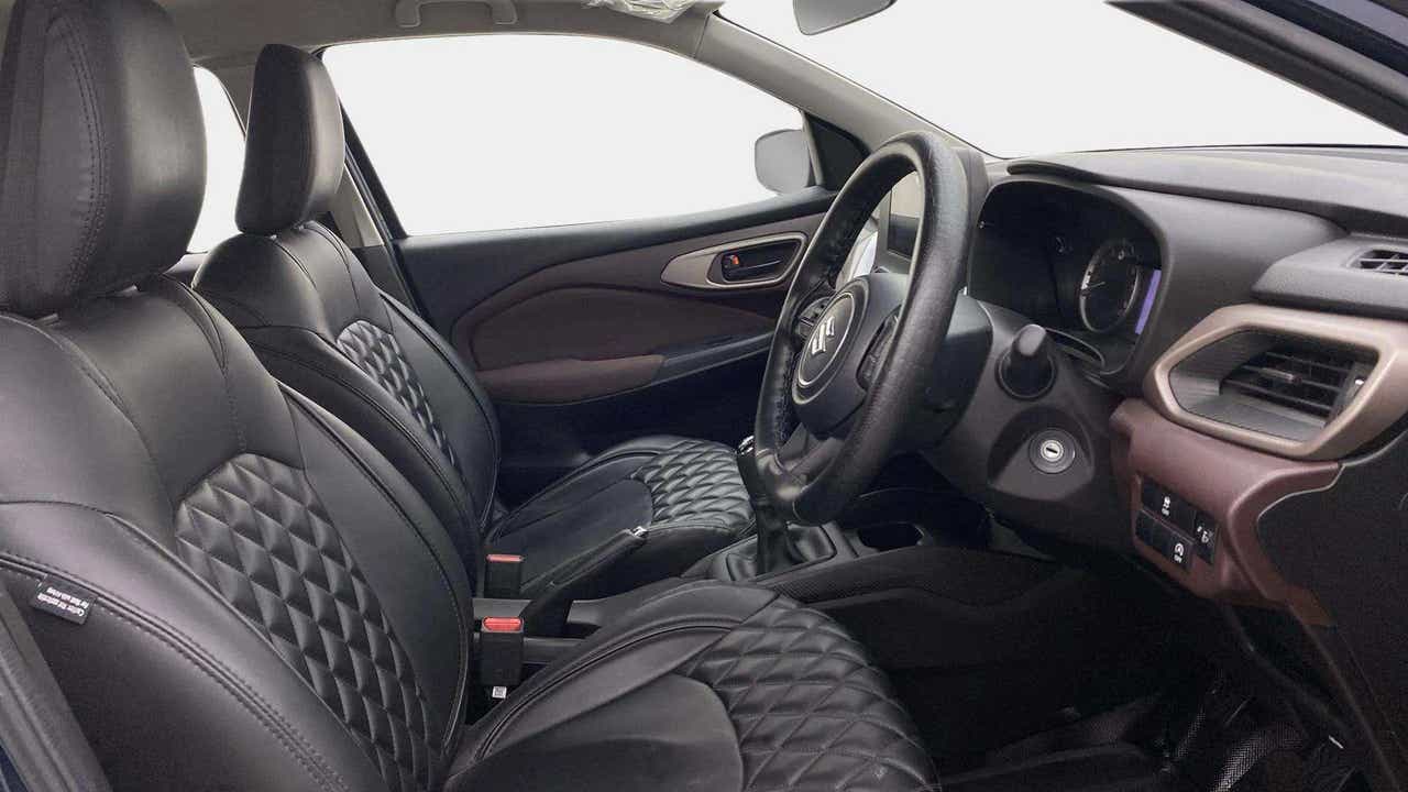 Interior front seats and dashboard of a Maruti Suzuki FRONX