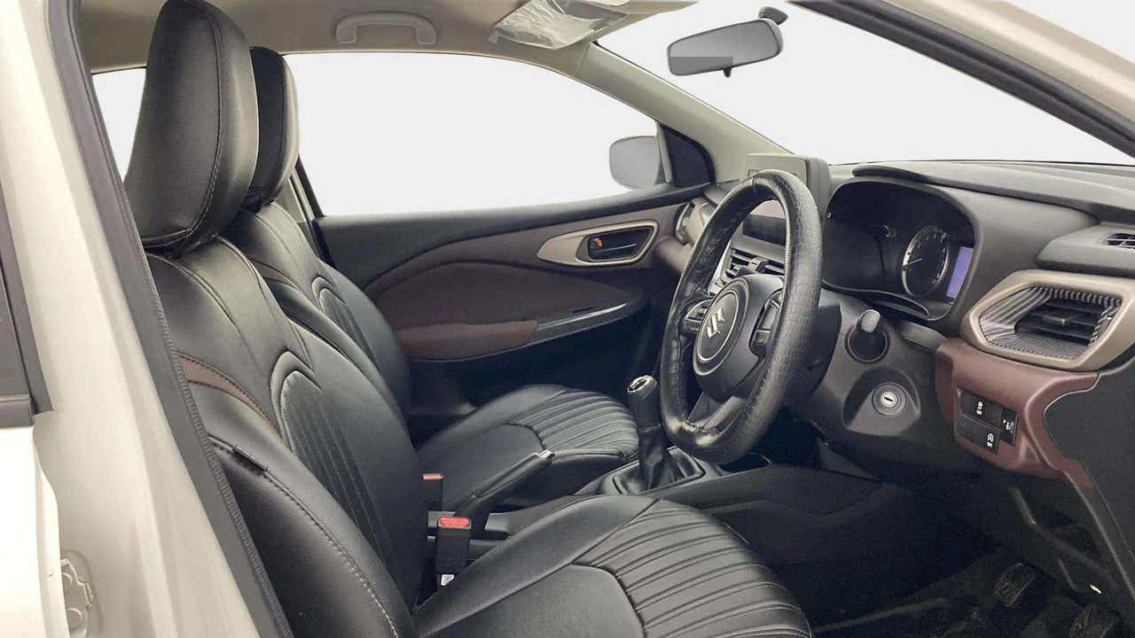 Interior front seats and dashboard of a Maruti Suzuki FRONX