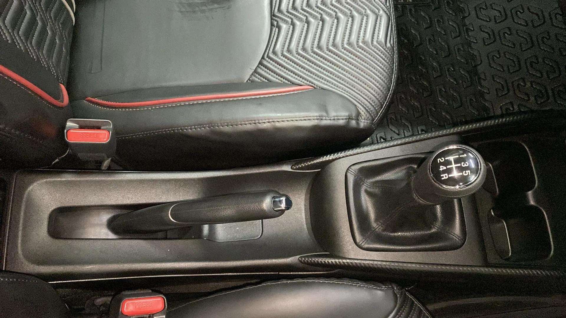 Interior gear lever and handbrake area of a Maruti Suzuki Fronx