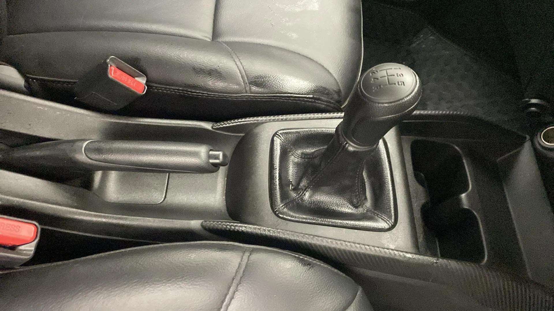 Gear lever and handbrake area of a Maruti Suzuki FRONX