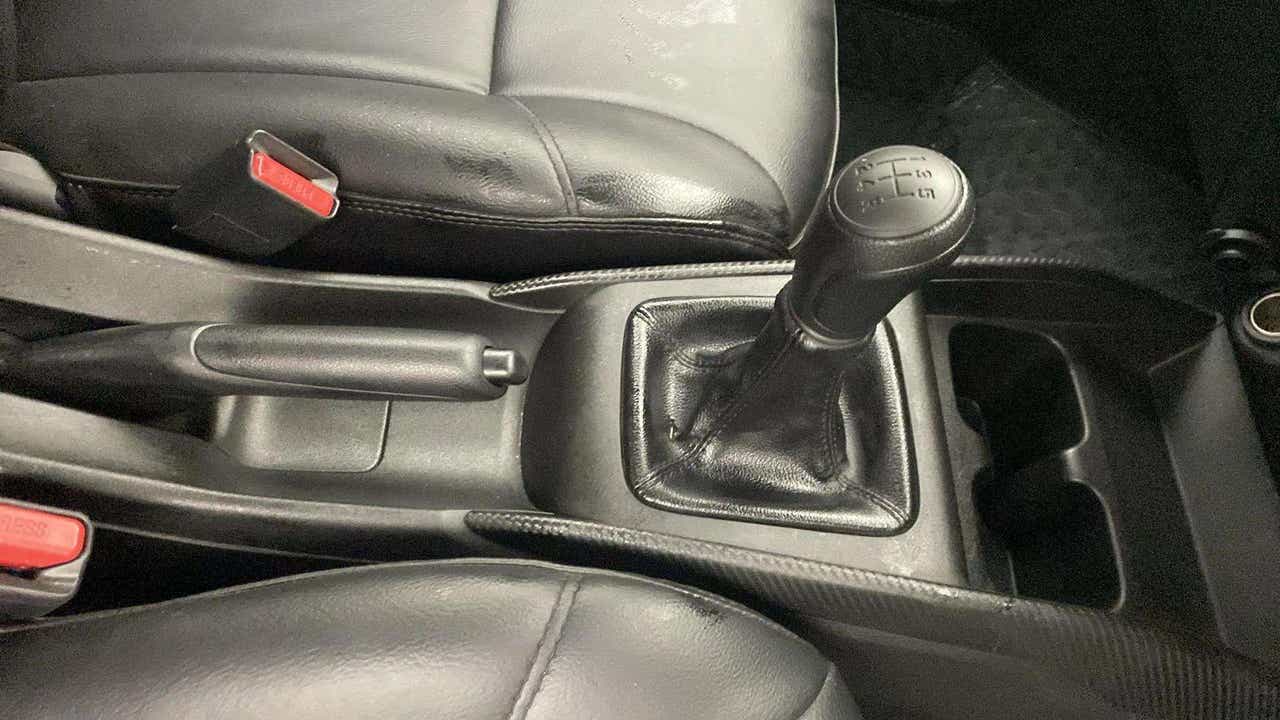 Gear lever and handbrake area of a Maruti Suzuki FRONX