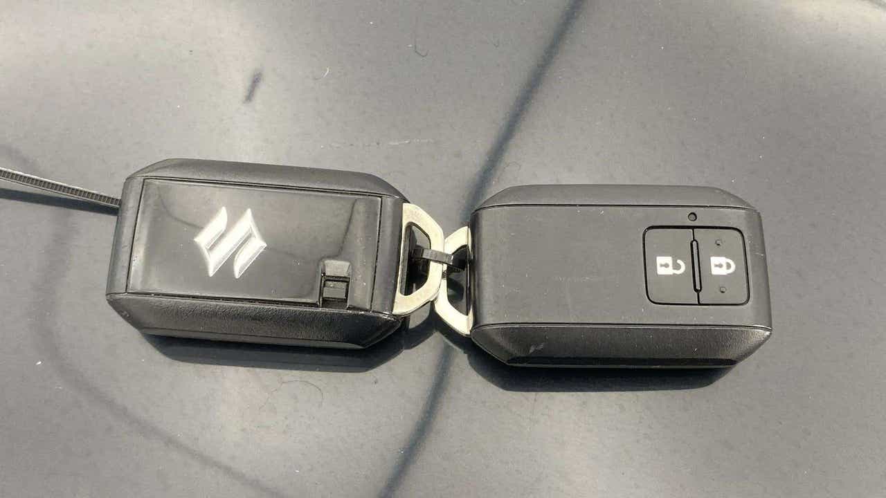 Close-up of a car key fob of a Maruti Suzuki FRONX