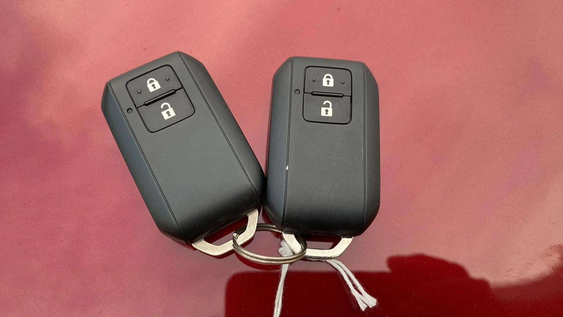 Close-up of the key fobs of a Maruti Suzuki FRONX