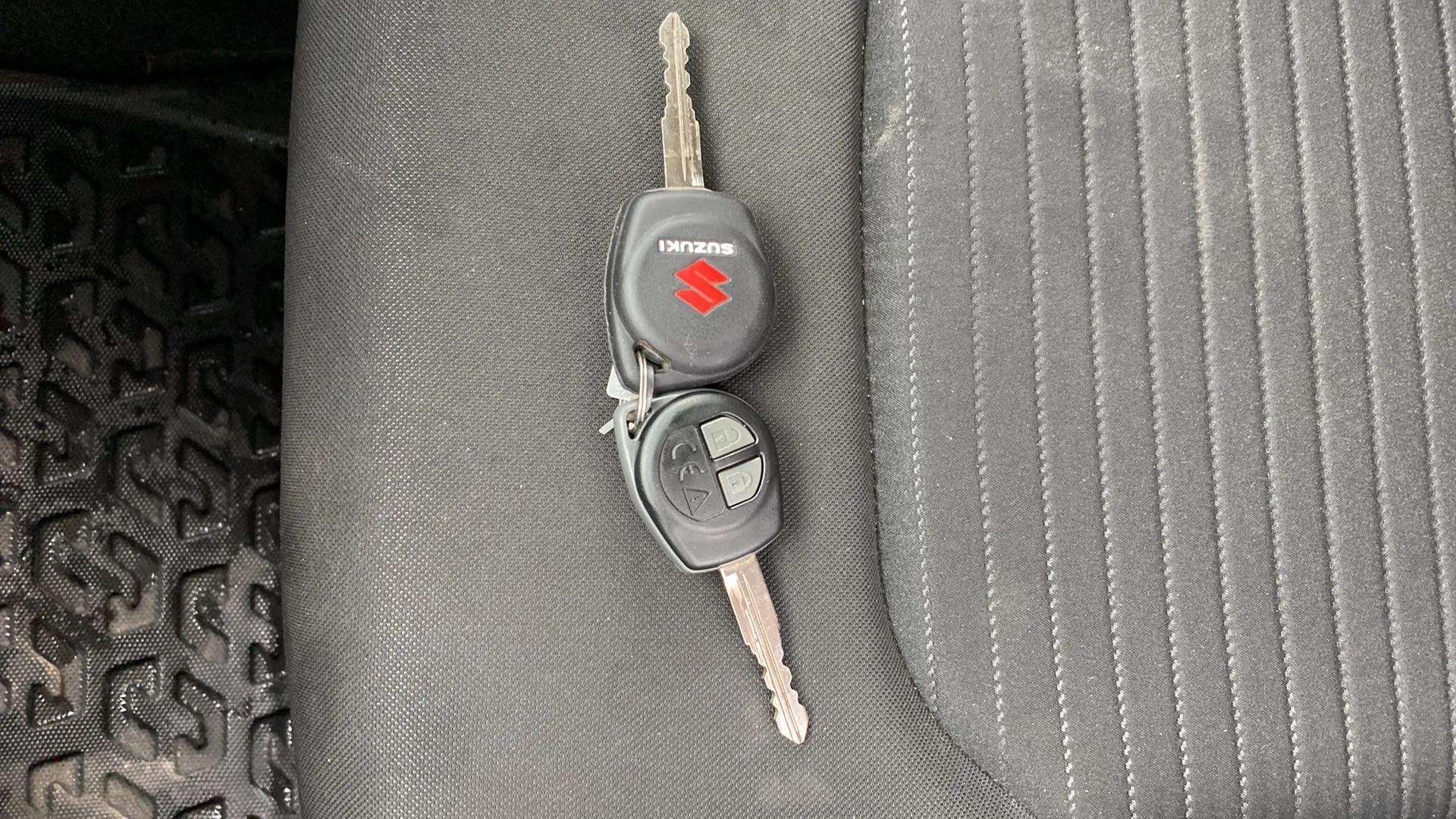 Car keys on the seat of a Maruti Suzuki FRONX