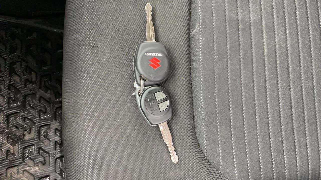 Car keys on the seat of a Maruti Suzuki FRONX