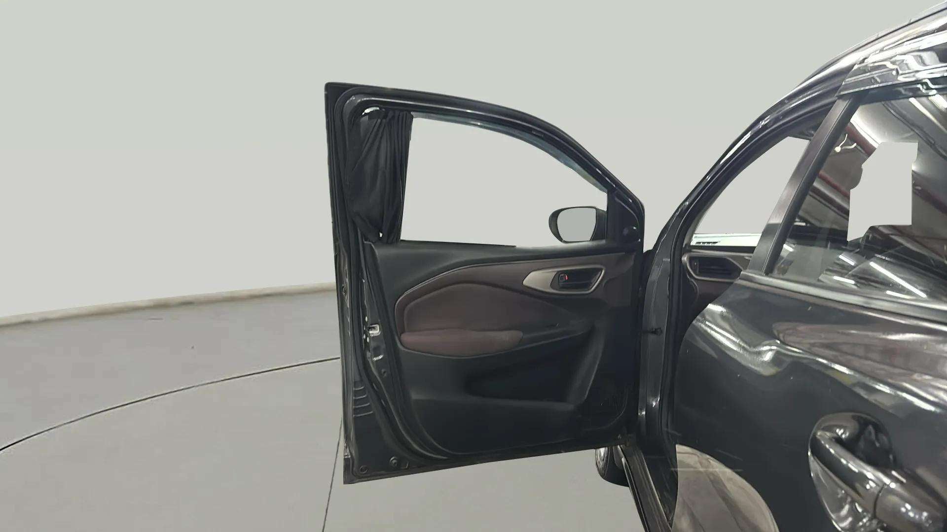 Interior driver side door of a Maruti Suzuki FRONX