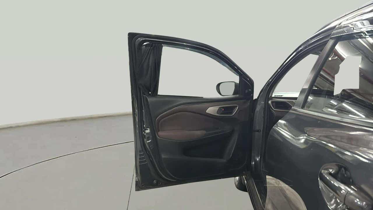 Interior driver side door of a Maruti Suzuki FRONX