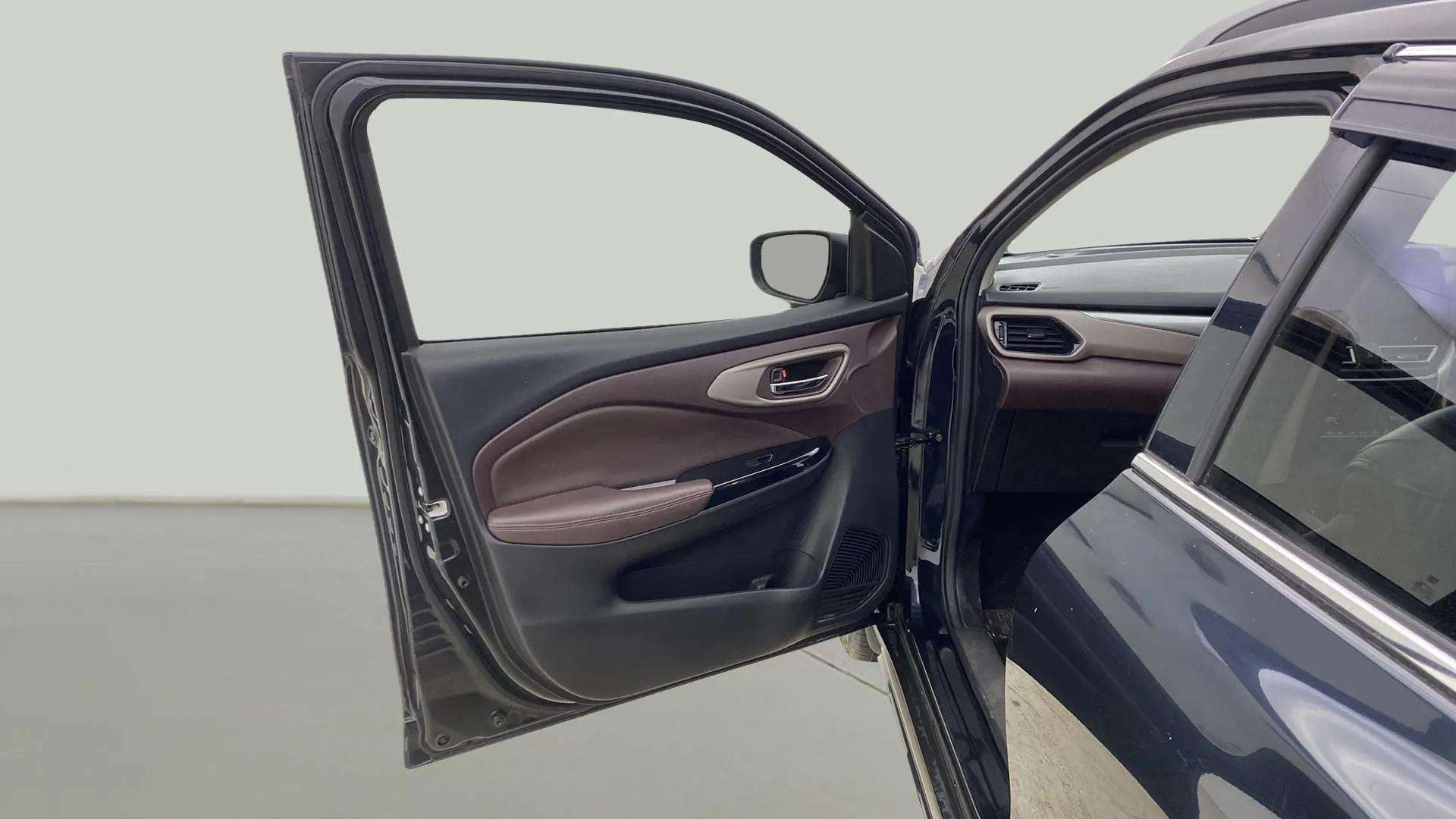 Driver side door interior of a Maruti Suzuki FRONX
