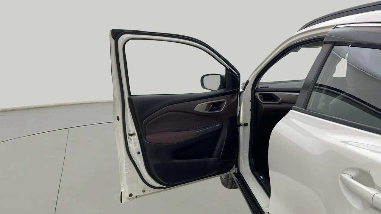 Front left door open view of a Maruti Suzuki FRONX