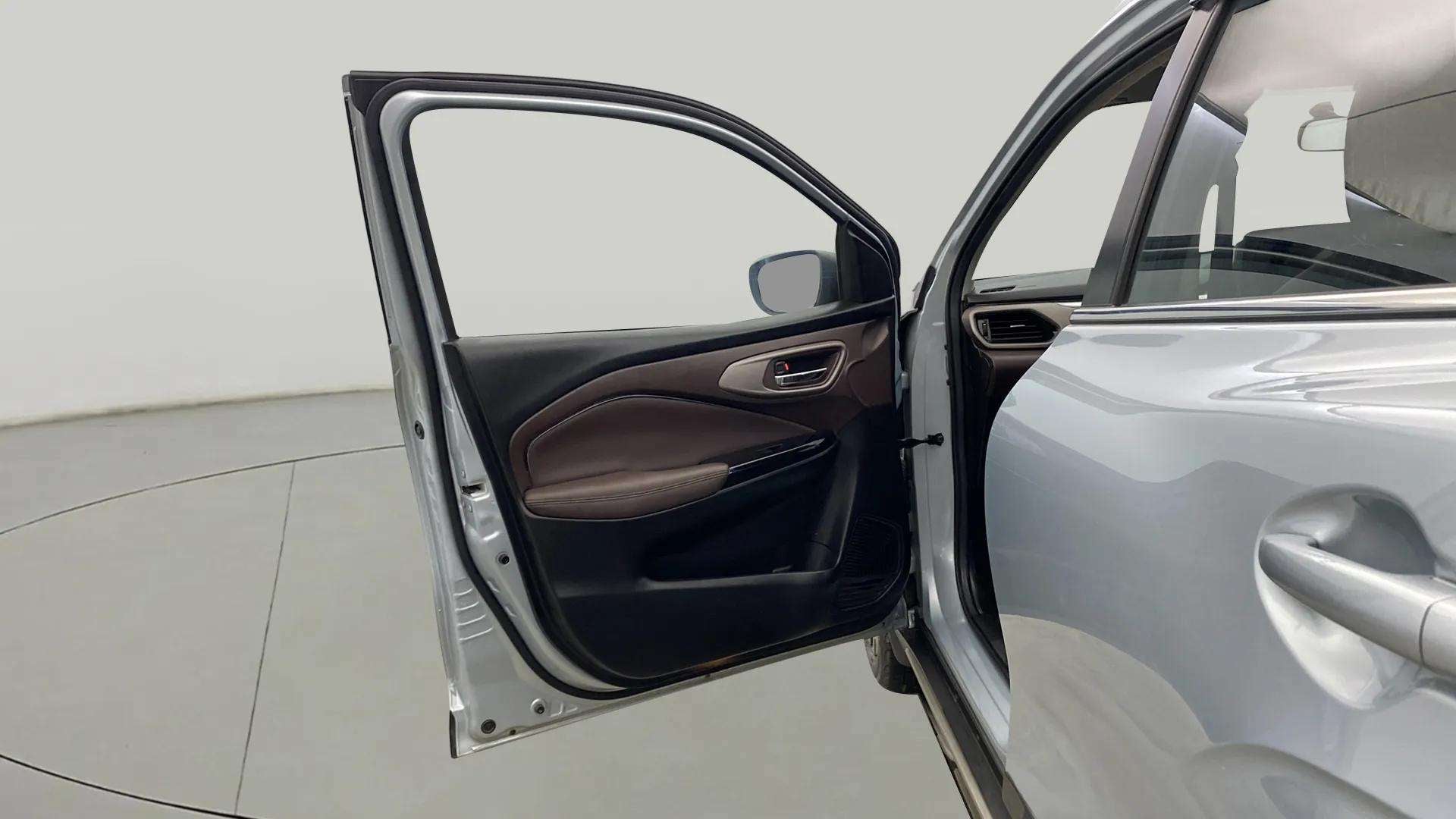 Driver side door interior of a Maruti Suzuki FRONX
