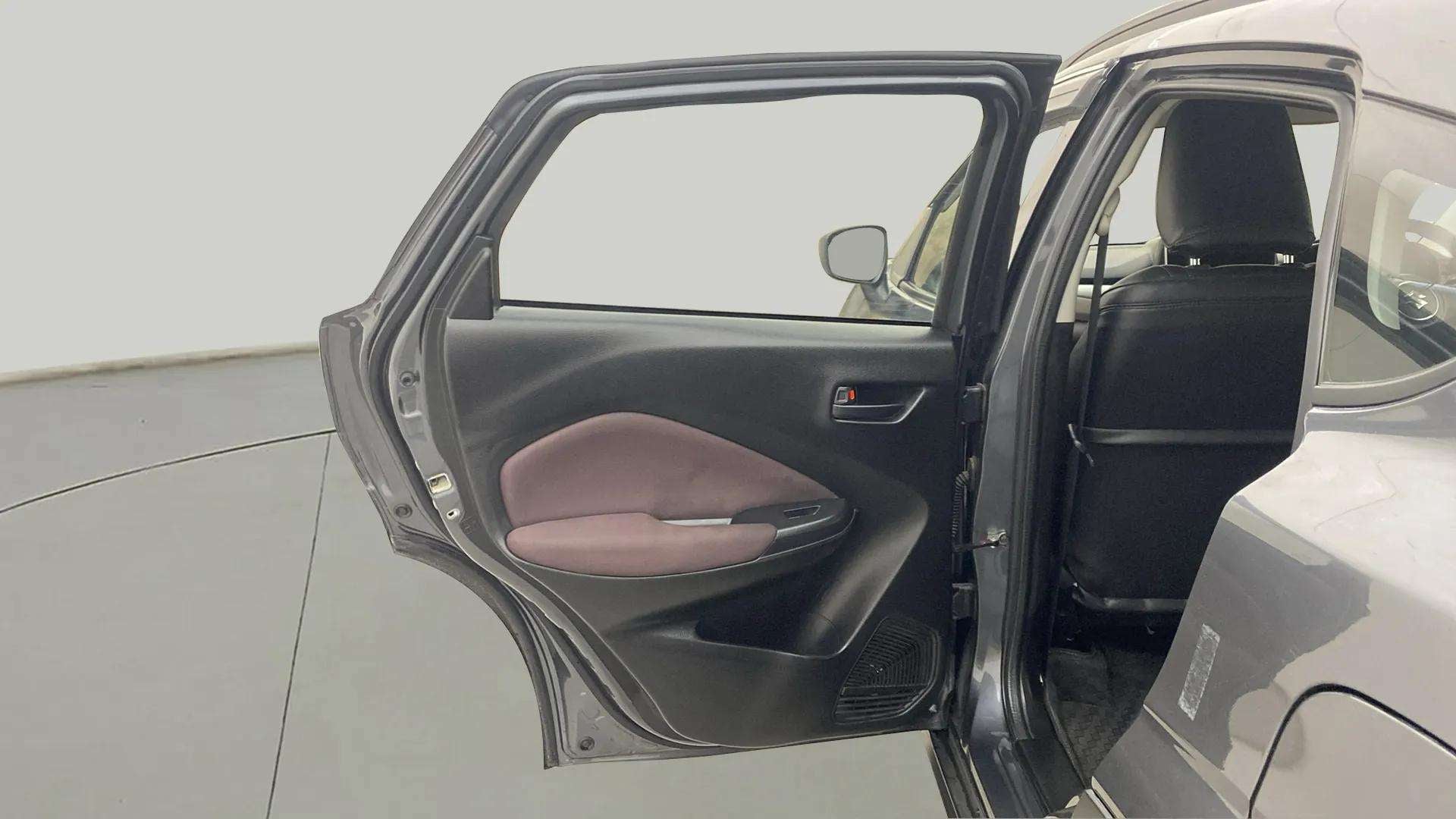 Rear left door and interior of a Maruti Suzuki FRONX