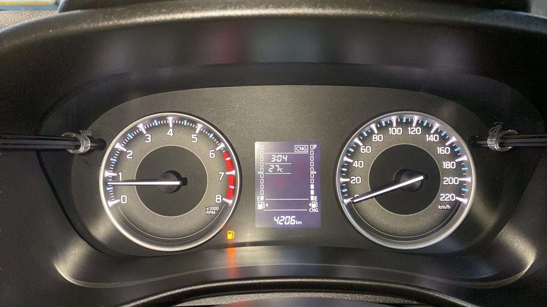 Interior dashboard instrument cluster of a Maruti Suzuki FRONX