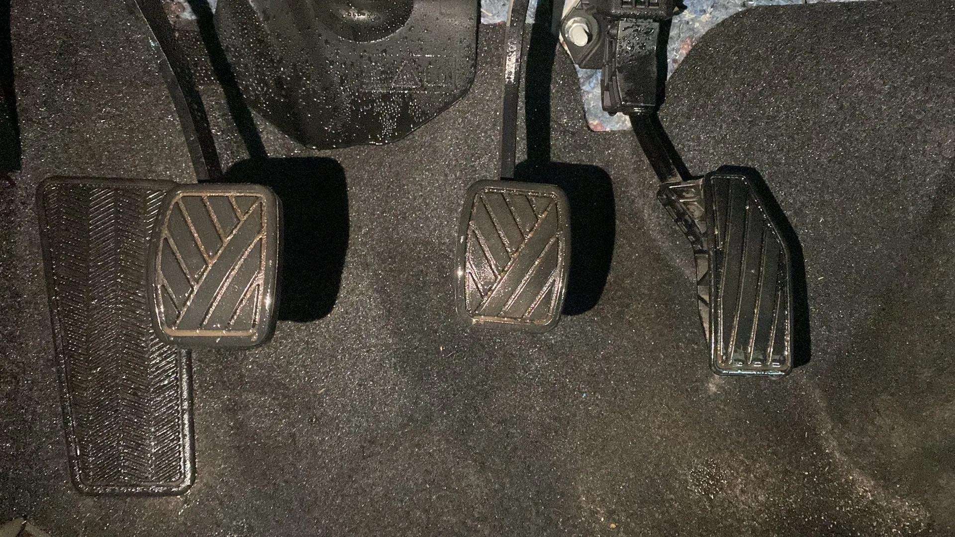 Close-up of the foot pedals of a Maruti Suzuki FRONX