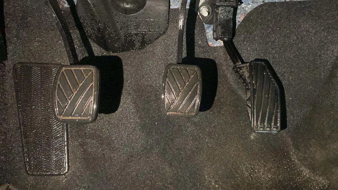 Close-up of the foot pedals of a Maruti Suzuki FRONX