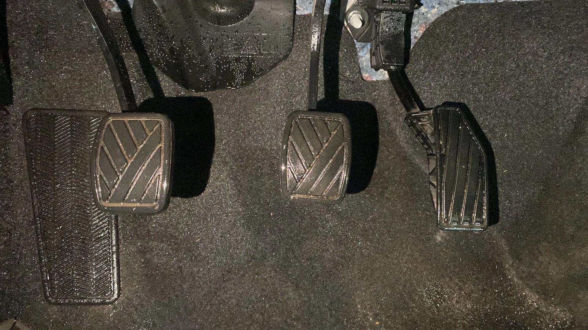Close-up of the foot pedals of a Maruti Suzuki FRONX