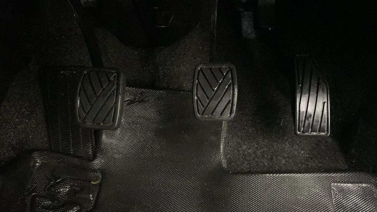 Foot pedals area of a Maruti Suzuki FRONX
