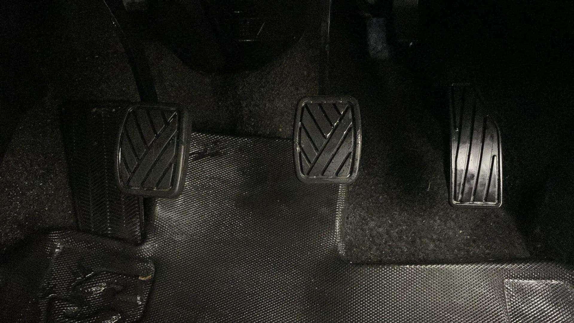 Foot pedals area of a Maruti Suzuki FRONX