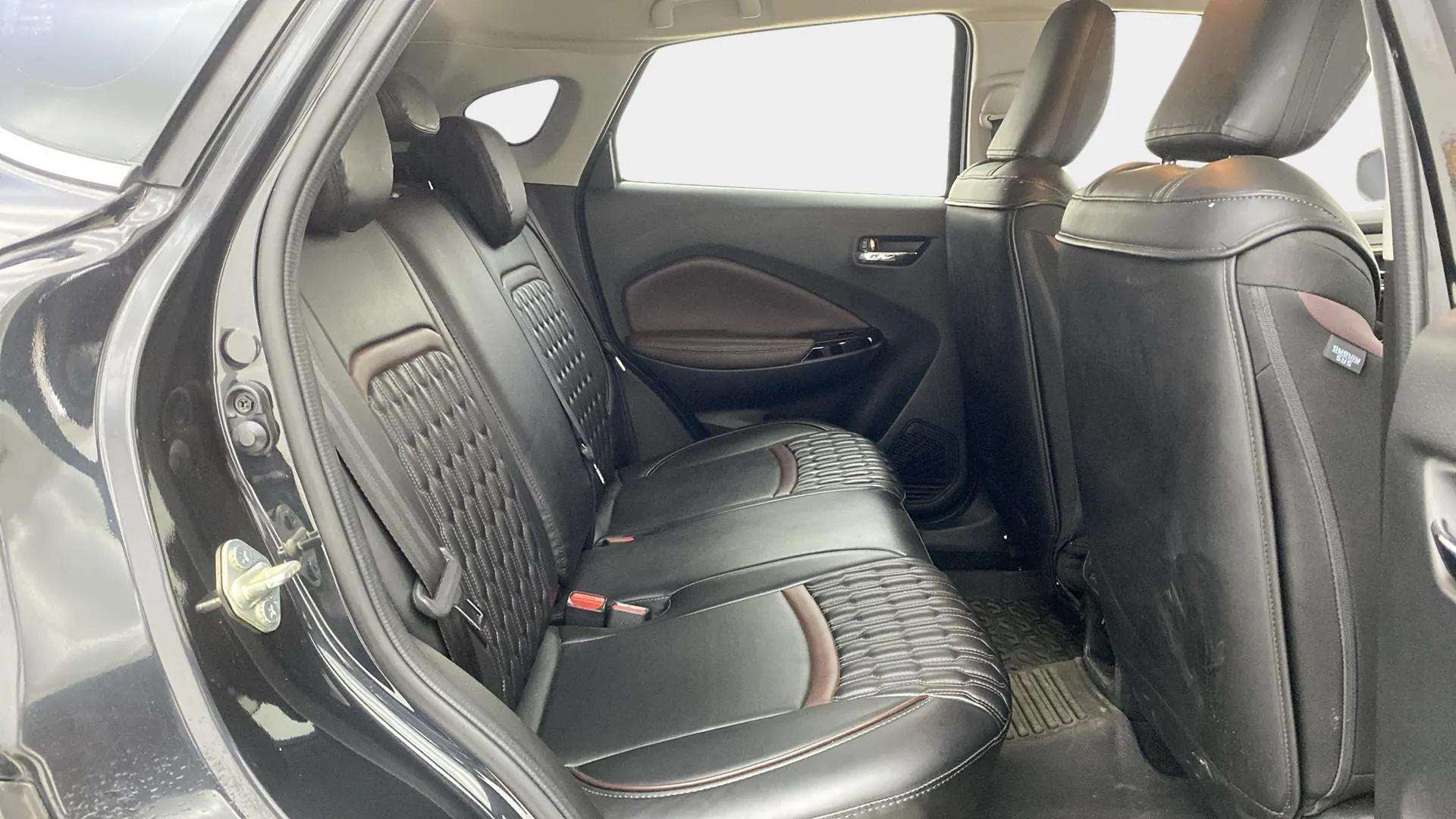 Rear seat and door panel view of a Maruti Suzuki FRONX