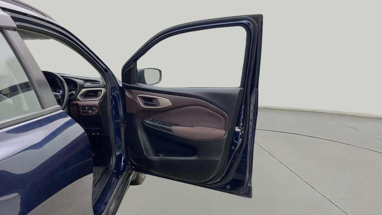 Driver-side door and dashboard of a Maruti Suzuki FRONX