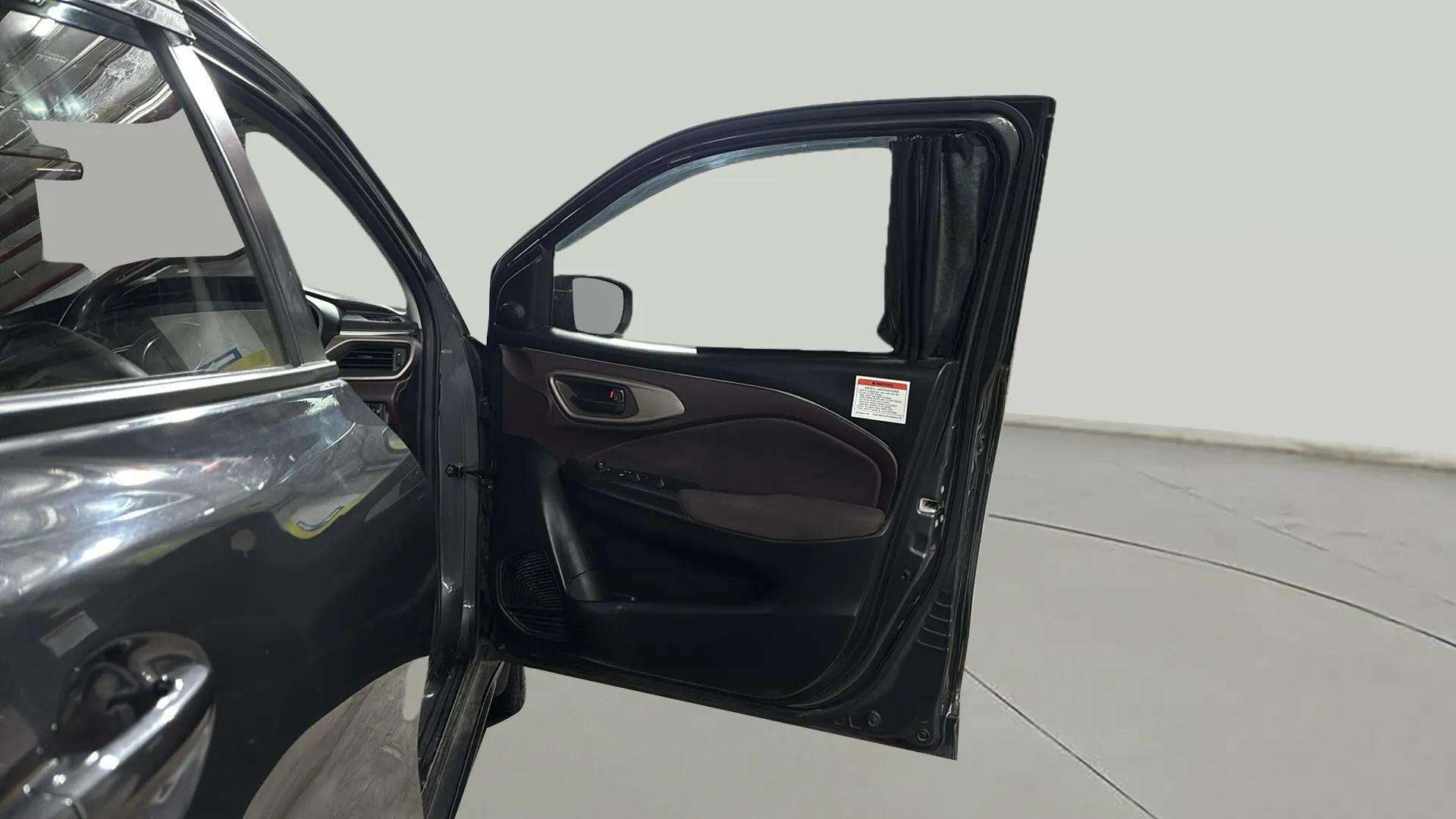 Front driver-side door panel of a Maruti Suzuki FRONX