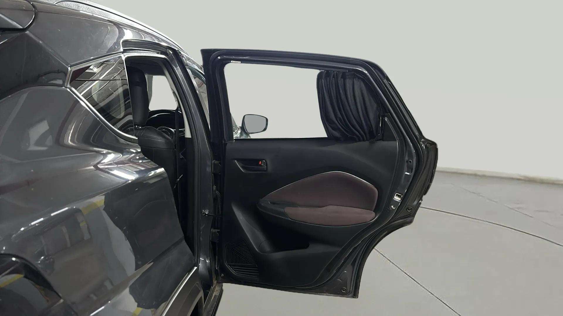 Rear left door and side view of a Maruti Suzuki FRONX