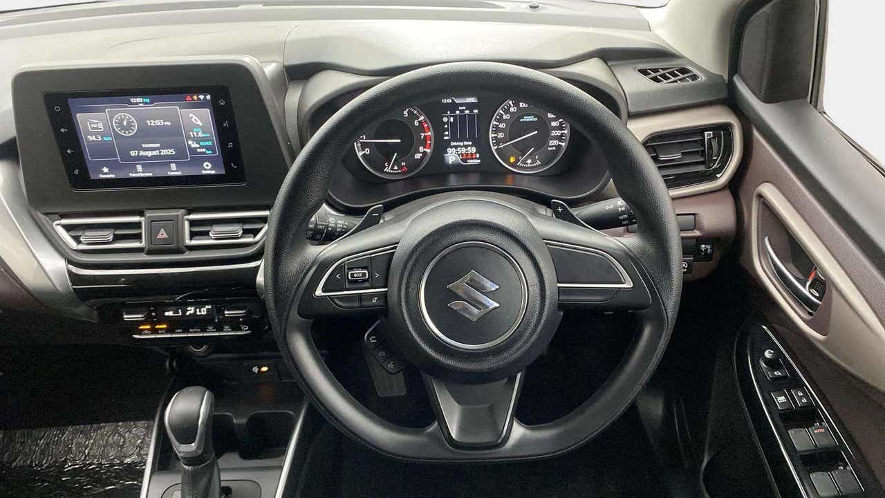 Interior dashboard view of a Maruti Suzuki FRONX