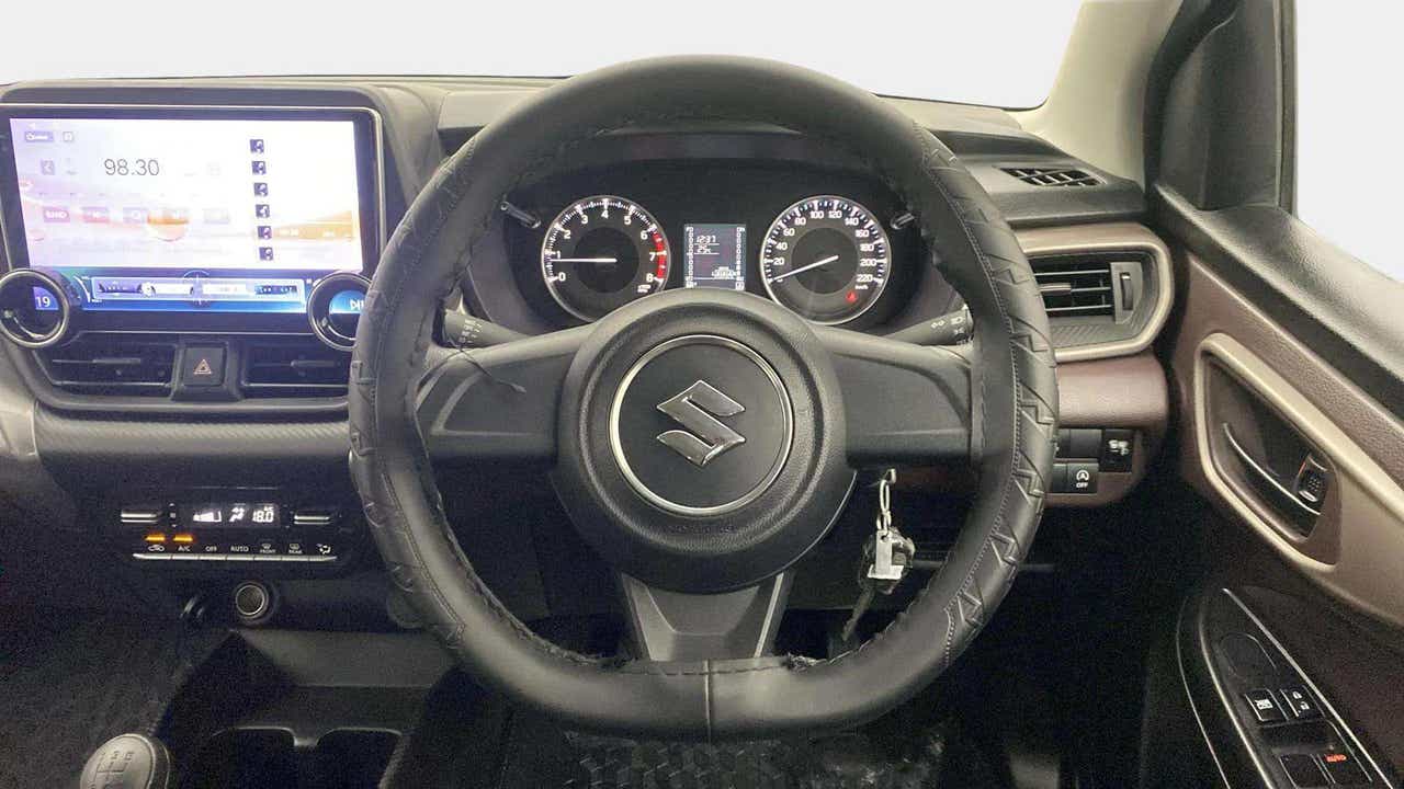 Dashboard and steering wheel of a Maruti Suzuki FRONX