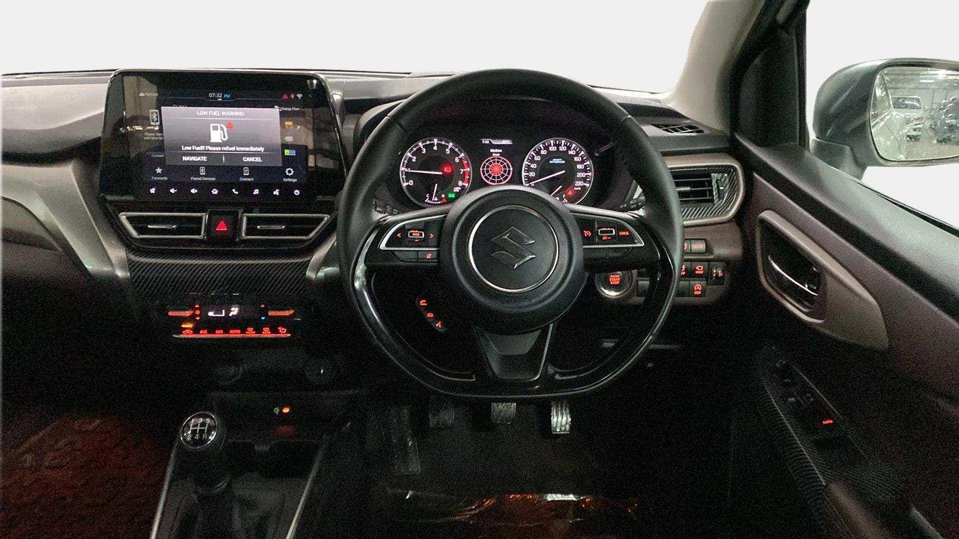 Dashboard and steering wheel of a Maruti Suzuki FRONX
