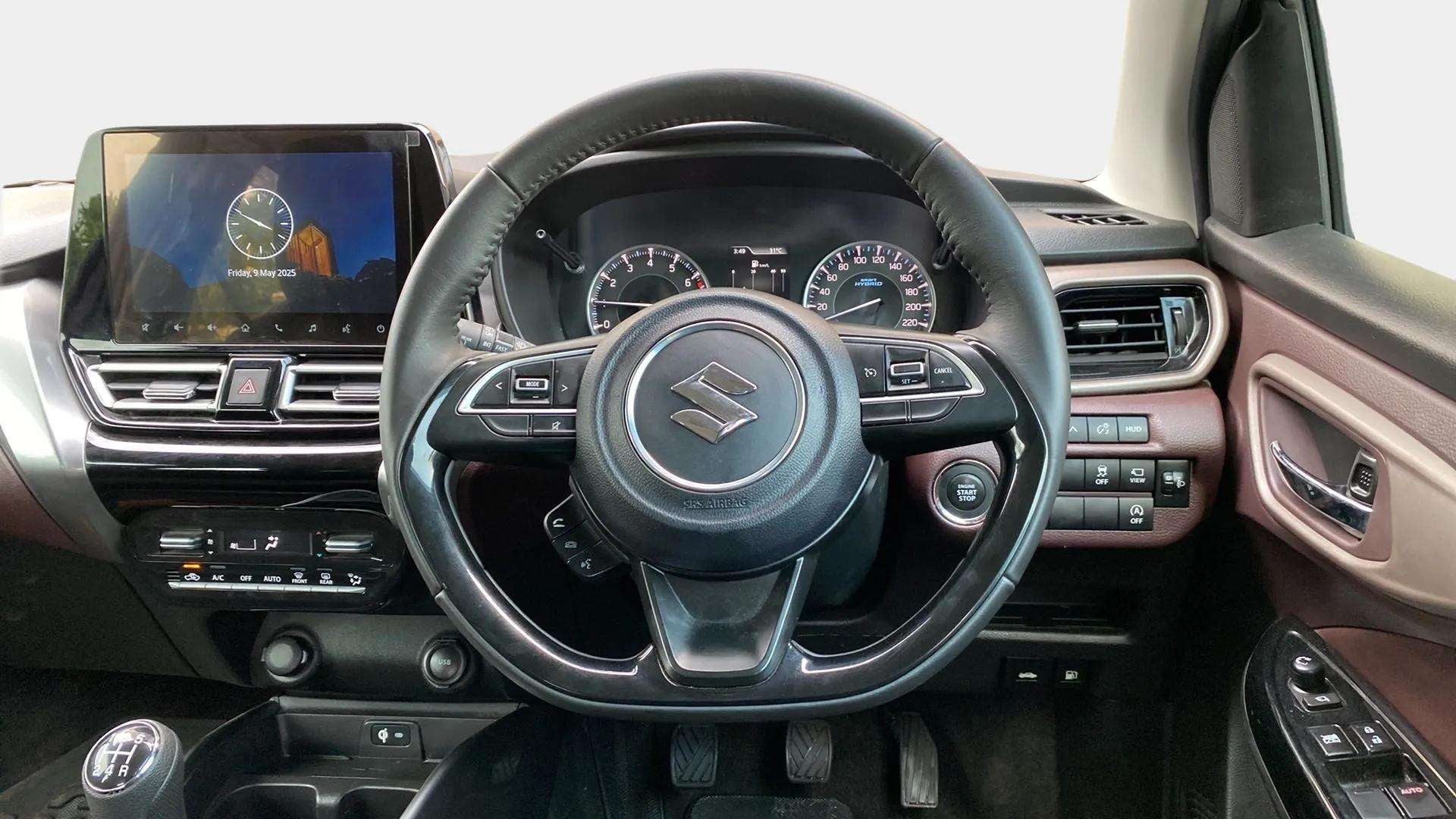 Dashboard and steering wheel of a Maruti Suzuki FRONX