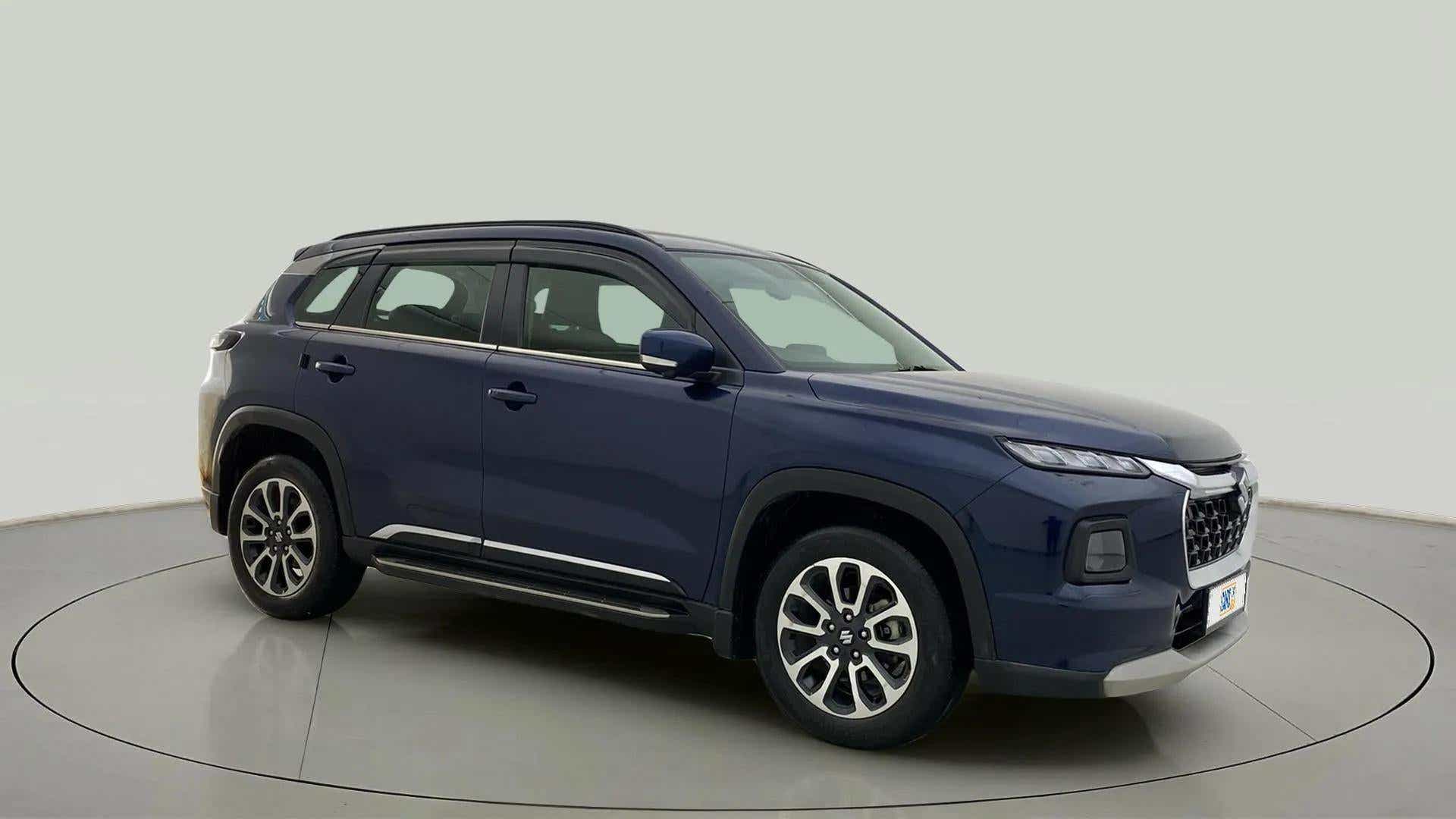 Side view of a Nexa Blue Maruti Suzuki Grand Vitara