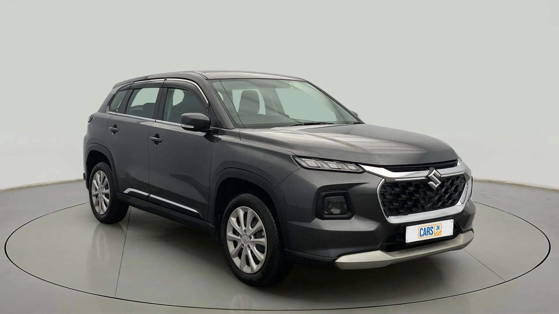 Front three-quarter view of a grandeur grey Maruti Suzuki Grand Vitara