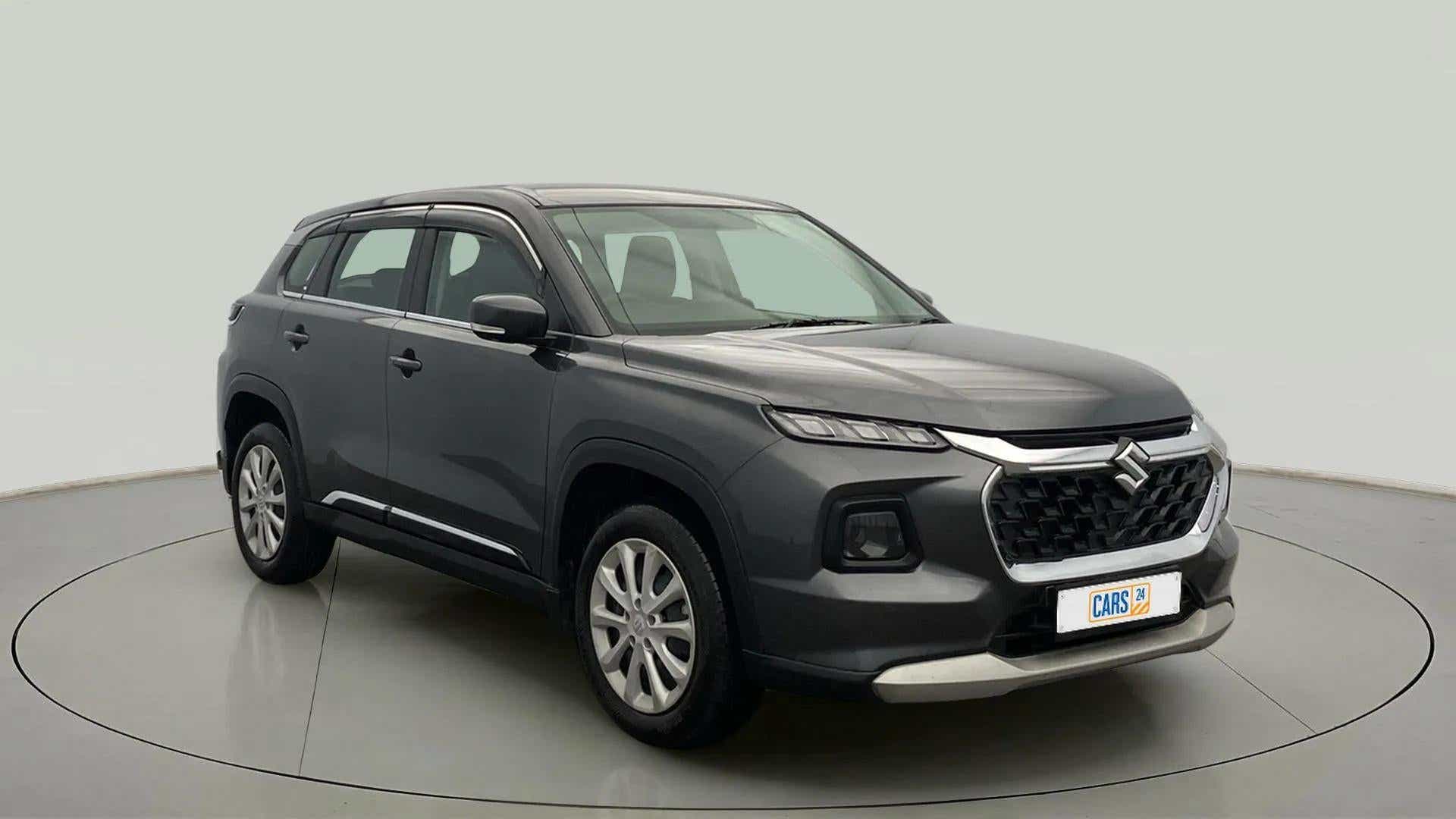 Front three-quarter view of a grandeur grey Maruti Suzuki Grand Vitara