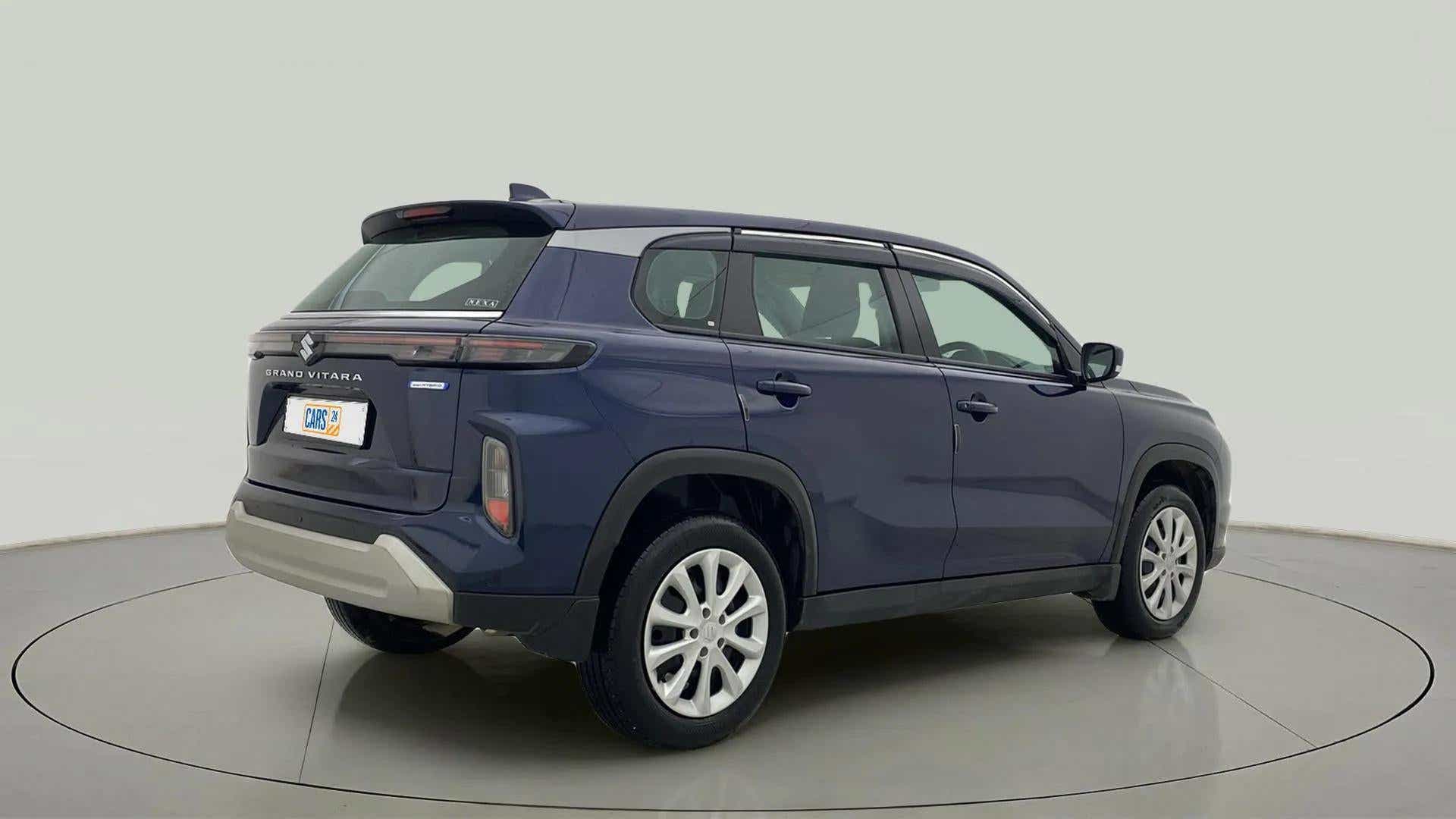 Rear three-quarter of a Nexa Blue Maruti Suzuki Grand Vitara