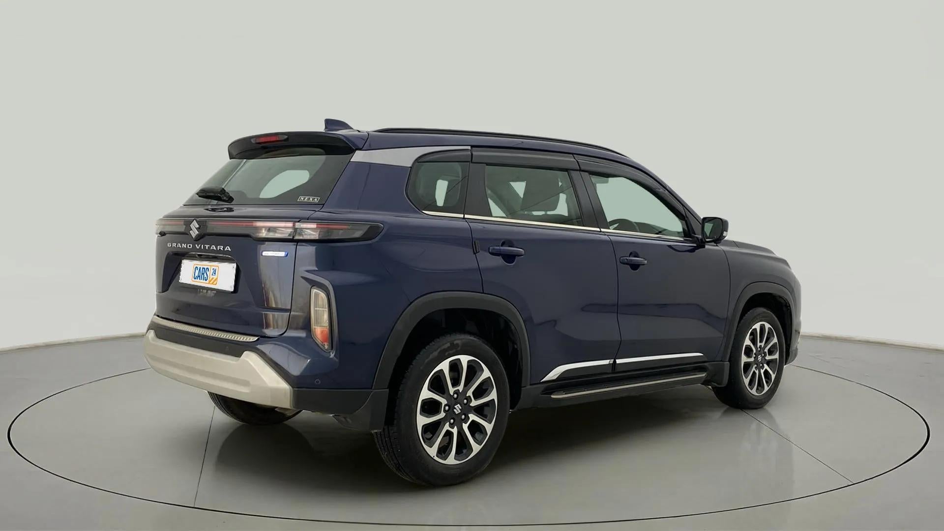 Rear three-quarter view of a Nexa Blue Maruti Suzuki Grand Vitara