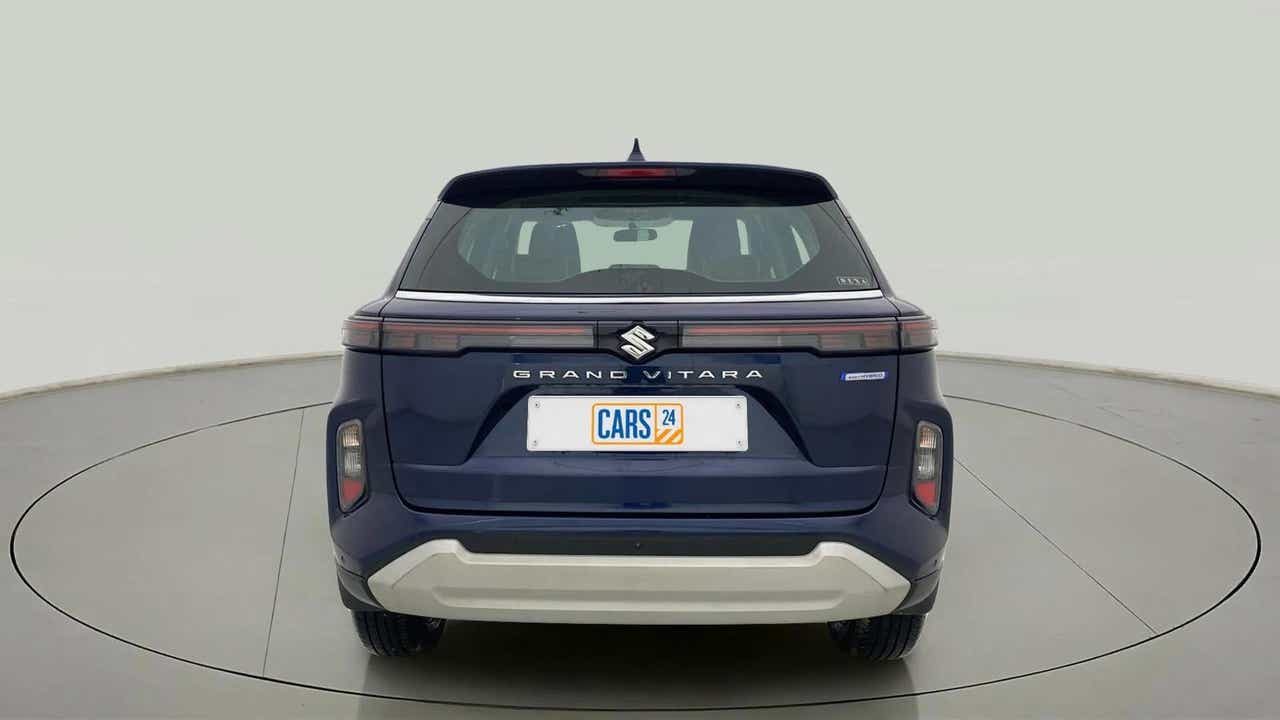 Rear view of a Nexa Blue Maruti Suzuki Grand Vitara